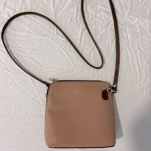Vera Pelle tan purse with brown strap. Like new condition.
